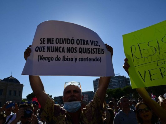 Imágenes: Fuertes protestas en Madrid tras medidas de bioseguridad adoptadas por el gobierno