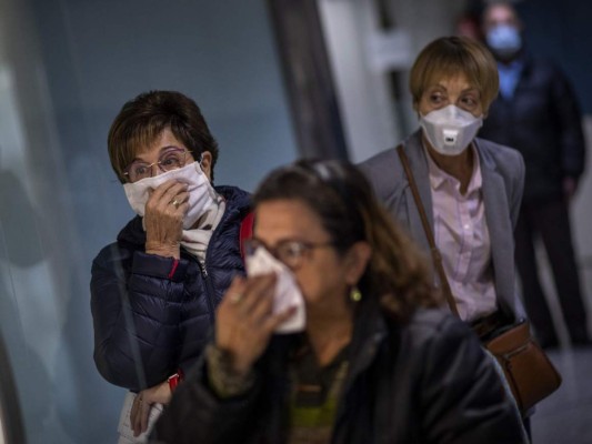 La carrera de España contra el coronavirus en imágenes