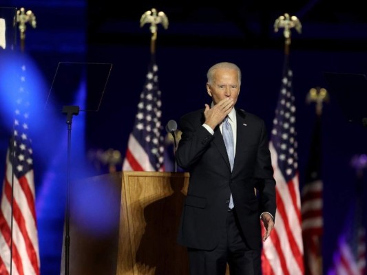 Imágenes de una noche histórica: Biden promete unir a EEUU tras derrotar a Trump