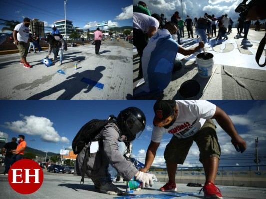 FOTOS: Hondureños repintan graffiti viral y exigen transparencia