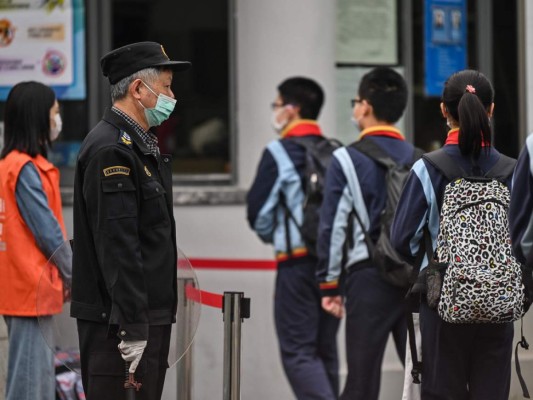 FOTOS: Bajo máxima seguridad, China regresa a clases