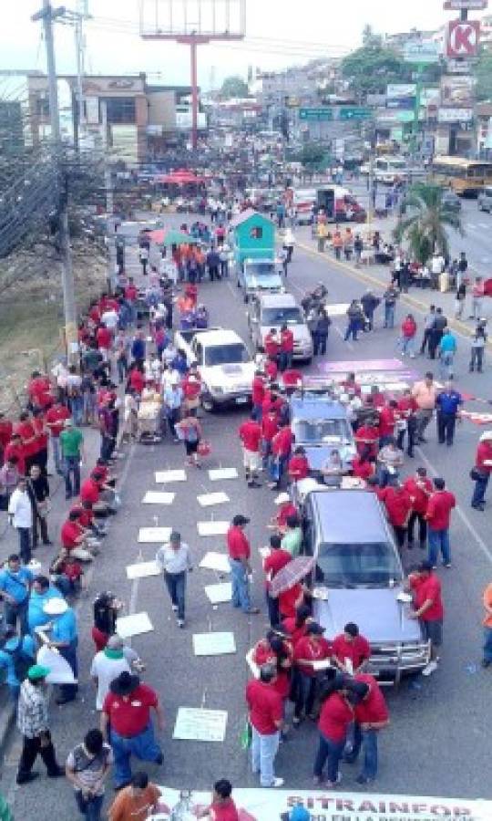 La marcha de los trabajadores hondureños en fotos