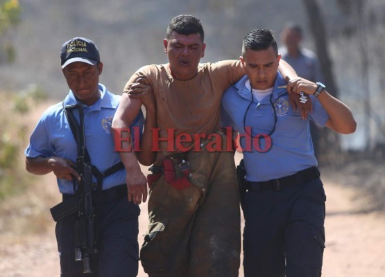 Las 15 fotos más impactantes del incendio que consumió al menos 400 vehículos en la DPI