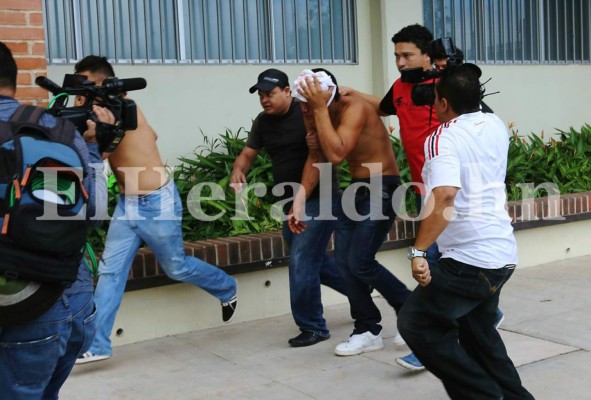 Las diez fotos más impactantes de la batalla entre universitarios y seguridad privada en la UNAH