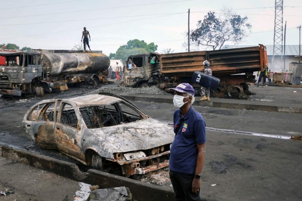 Las dolorosas escenas tras la explosión que ya suma 98 muertos en Sierra Leona