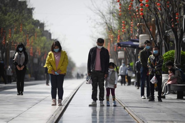 FOTOS: China rinde sentido homenaje a miles de víctimas del Covid-19