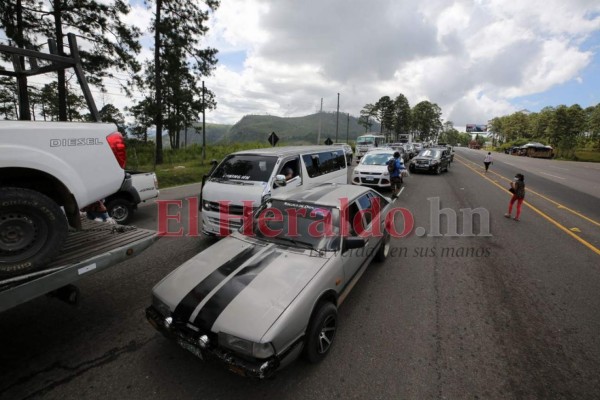 Caravanas y retenes: así se realizó el retorno seguro a la capital (FOTOS)