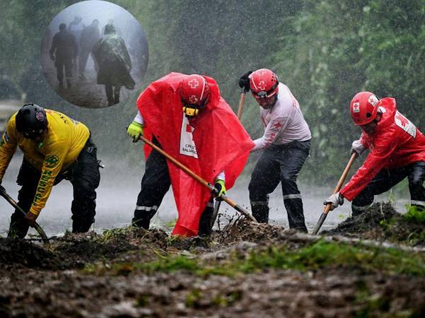 socorristas buscan a dos hombres que fueron arrastrados por el río Cahabón, en el norte de Guatemala.