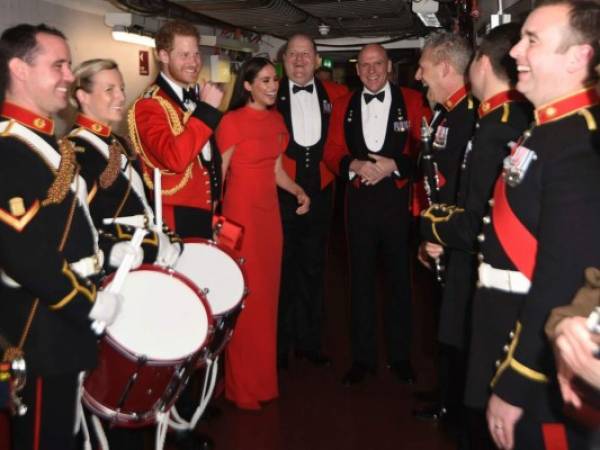 El príncipe británico Harry y Meghan, duquesa de Sussex, junto con las bandas en masa de los marines reales de su majestad asisten al festival de música Mountbatten en el Royal Albert Hall de Londres, el sábado 7 de marzo de 2020.