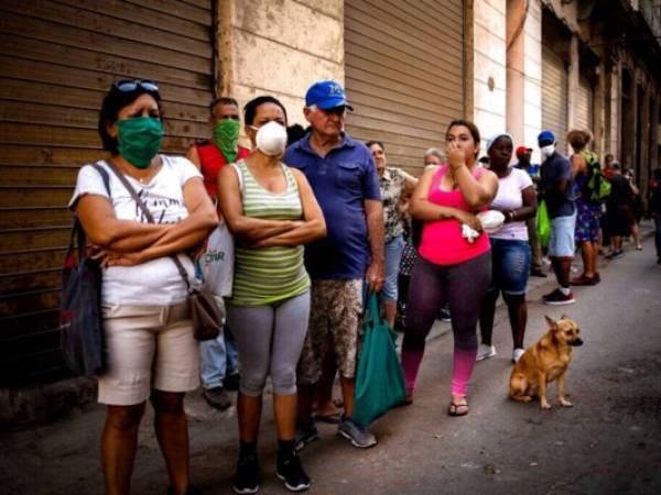 Las autoridades consideran que el virus ha sido controlado en el país caribeño. Foto: AFP