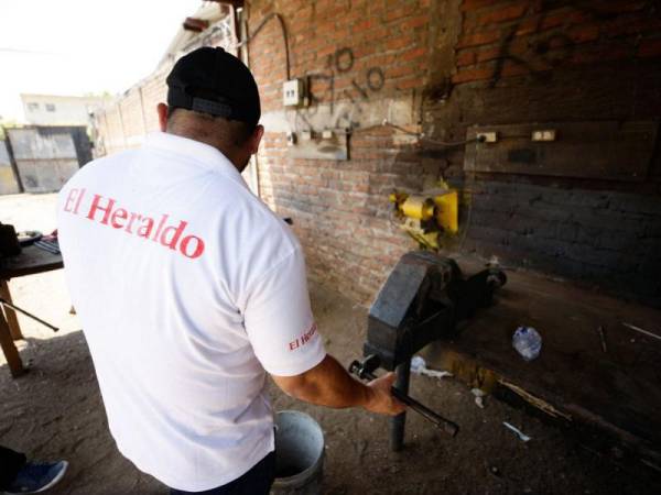 La prensa de hierro del taller industrial donde trabajaba el joven. La familia asegura que esperará hasta las últimas instancias, porque no creen que haya fallecido.