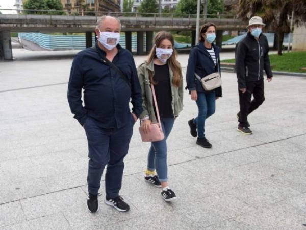 En España el uso de la mascarilla será obligatorio hasta frenar el virus. Foto AFP