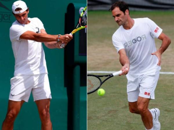 Rafa Nadal ante Roger Federer, dos leyendas que se ven de nuevo cara a cara en Wimbledon. (AFP)