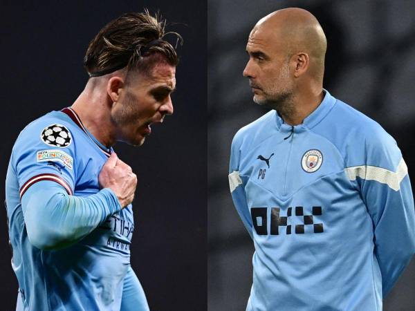 De un lado Jack Grealish y del otro el entrenador español del Manchester City, Pep Guardiola.