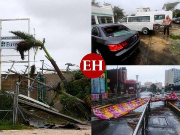 Fuertes ráfagas de viento, lluvia, postes y árboles caídos dejaba el huracán Delta en la ciudad de Cancún (sureste), tras tocar tierra este miércoles en la costa caribeña mexicana, donde no se reportan víctimas. Fotos: AFP/AP