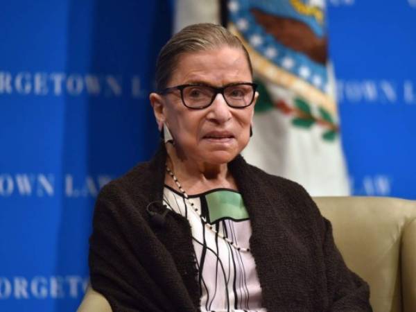 (FILES) In this file photo taken on September 20, 2017 US Supreme Court Justice Ruth Bader Ginsburg looks on as she speaks to first year Georgetown University law students in Washington, DC. - Justice Ruth Bader Ginsburg has been hospitalized November 23, 2019, after experiencing chills and fever, The Supreme Court says. (Photo by Nicholas Kamm / AFP)