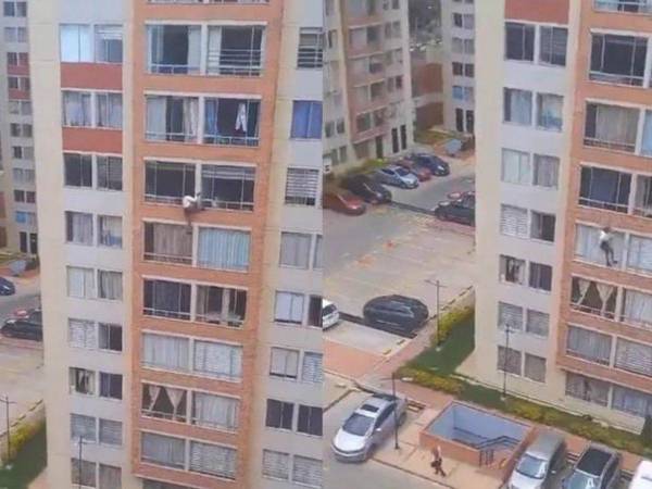 Una fémina colombiana intentaba salir de un edificio mientras había un temblor en una ciudad de Colombia.