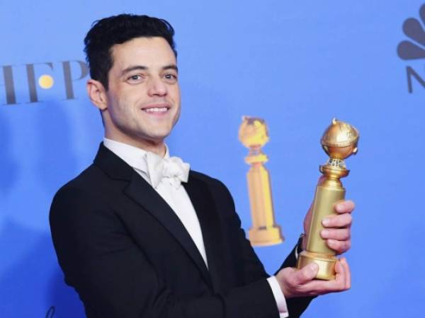 La cinta cerró la noche con dos estatuillas, incluida la de mejor actor para Rami Malek. (Foto: AFP)