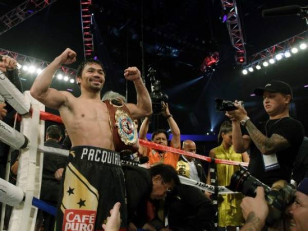 Vargas tuvo dificultades para enfrentar la velocidad de Pacquiaoque al final se quedó con el título. Foto: AP.