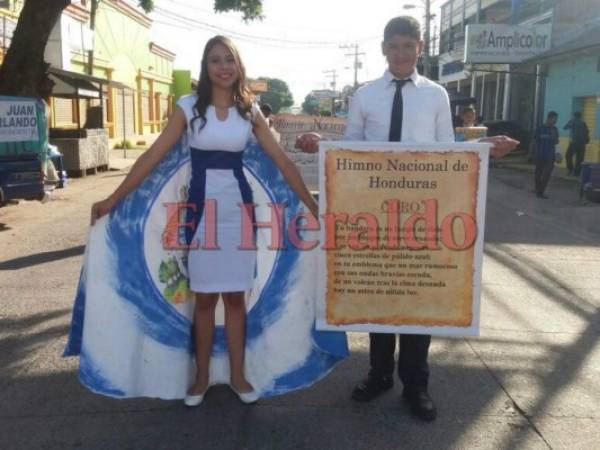 Celebrando el 196 cumpleaños de la patria, Cinthia Rodríguez y Rafael Mairena del Instituto South Internacional School de Choluteca representan el Escudo y el Himno Naiconal. Choluteca. Foto: Gissela Rodríguez.