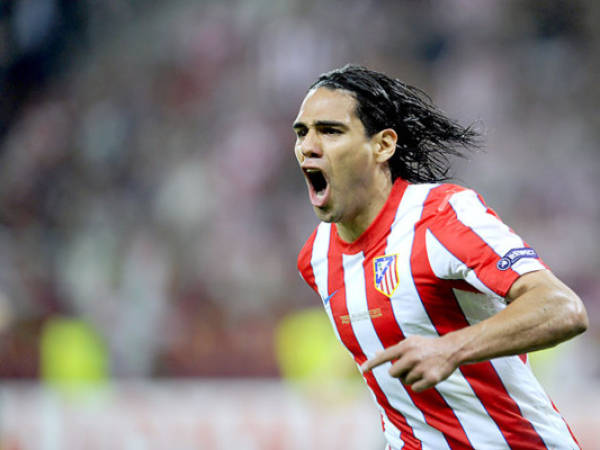 Atletico Madrid's Colombian forward Radamel Falcao celebrates after scoring a goal during the UEFA Europa League final football match between Club Atletico Madrid and Athletic Club Bilbao on May 9, 2012 at the National Arena stadium in Bucharest. AFP PHOTO / RAFA RIVAS