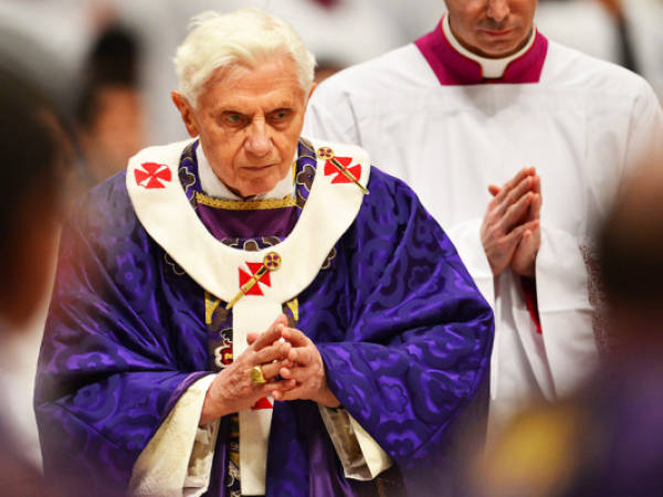 Pope Benedict XVI leads the mass for Ash Wednesday, opening Lent, the forty-day period of abstinence and deprivation for the Christians, before the Holy Week and Easter, on February 13, 2013 at St Peter's basilica at the Vatican. Pope Benedict XVI made his first public appearance on Wednesday since his shock resignation announcement, asking thousands of cheering pilgrims at the Vatican to 'keep praying for me'. AFP PHOTO / GABRIEL BOUYS