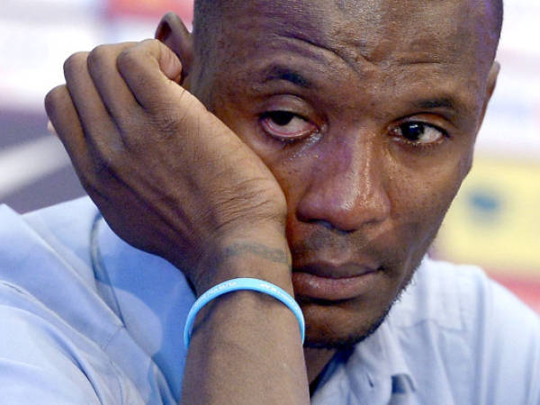 FC Barcelona's Eric Abidal, from France, reacts during a news conference at the Camp Nou stadium in Barcelona, Spain, Thursday, May 30, 2013. Eric Abidal will be leaving Barcelona after six trophy-laden seasons and having fought back from both a liver tumor and a liver transplant to play again. Abidal thanked his teammates, his coaches, and above all the team doctors and physical therapists that helped him through his medical issues. (AP Photo/Manu Fernandez)