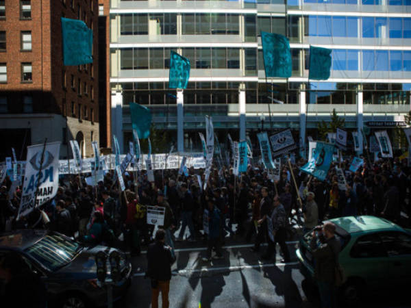 WASHINGTON, DC - OCTOBER 26, 2013: Marchers make their way through downtown Washington D.C. during the Stop Watching Us Rally protesting surveillance by the U.S. National Security Agency, on October 26, 2013, in front of the U.S. Capitol building in Washington, D.C. The rally began at Union Station and included a march that ended in front of the U.S. Capitol building and speakers such as author Naomi Wolf and former senior National Security Agency senior executive Thomas Drake. Allison Shelley/Getty Images/AFP== FOR NEWSPAPERS, INTERNET, TELCOS & TELEVISION USE ONLY ==