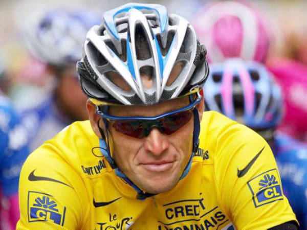 (FILES): This Juy 7, 2005 file photo shows Lance Armstrong of the US during the sixth stage of the 92nd Tour de France cycling race between Troyes and Nancy. American cyclist Lance Armstrong will be stripped of his seven Tour de France titles and banned from cycling for life, US Anti-Doping Agency chief Travis Tygart said August 23, 2012. The decision came after Armstrong announced he was dropping his fight against USADA's charges that he used performance-enhancing drugs to win the most prestigious event in the sport from 1999 to 2005. AFP PHOTO / Files / JOEL SAGET