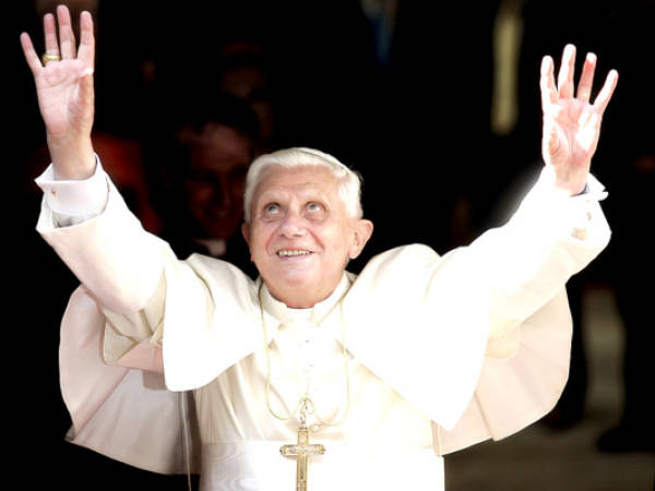 (FILES) - Picture taken on July 8, 2006 of Pope Benedict XVI waving to pilgrims on arrival at the Generalitat Palace in Valencia. Pope Benedict XVI announced on February 11, 2013 he will resign as leader of the world's 1.1 billion Catholics on February 28 because his age prevented him from carrying out his duties -- an unprecedented move in the modern history of the Catholic Church. AFP PHOTO JAVIER BARBANCHO