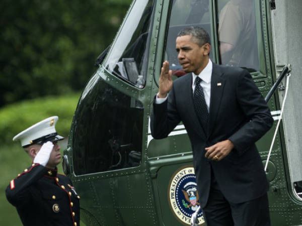 US President Barack Obama walks from Marine One as he arrives at the White House May 2, 2012 in Washington, DC. President Obama was returning from a surprise trip to Afghanistan where he signed a strategic partnership agreement with President Hamid Karzai, visited troops and addressed Americans from Bagram Air Base. AFP PHOTO/Brendan SMIALOWSKI