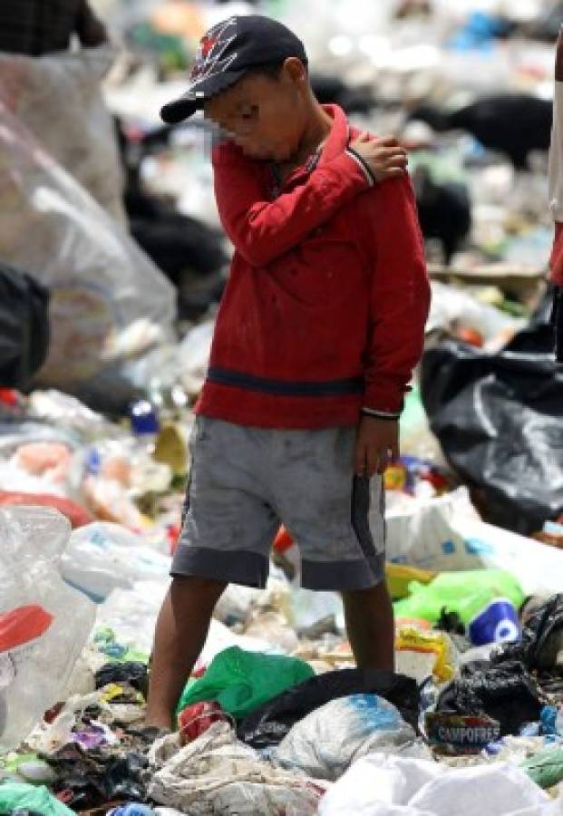 Honduras: El cruel mundo de los niños pepenadores en la capital