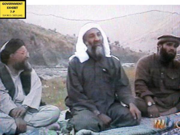 In this undated Photo provided by the United States Attorneys Office for the Southern District of New York, defendant Suliman Abu Ghayth, right, is seated with al-Qaida founder Osama Bin Laden, center, and Bin Ladens deputy, Ayman al Zawahiri, in Afghanistan. Suliman Abu Ghayth, is being tried in New York, charged with plotting to kill Americans by being a motivational speaker at al-Qaida training camps before the Sept. 11 attacks and as a spokesman for the terror group afterward when it sought to recruit more militants to its cause. (AP Photo/US Attorneys Office for the Southern District of New York)