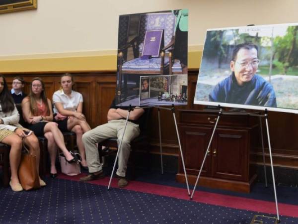 China rechazó este viernes las críticas extranjeras sobre la muerte de Liu Xiaobo, el disidente vigilado hasta después de la muerte. (Foto: AFP/ El Heraldo Honduras/ Noticias de Honduras)