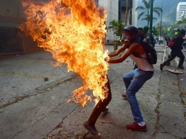 Con la muerte de Figuera ya son 65 las personas que han perdido la vida durante las manifestaciones opositoras. (Foto: AFP/El Heraldo Honduras/ Noticias de Honduras)