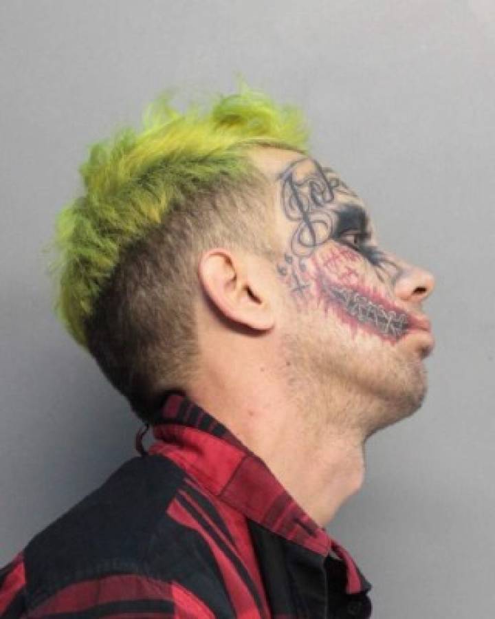 This photo provided by the Miami-Dade Corrections and Rehabilitation Department shows Lawrence Sullivan, who was arrested in Miami-Dade County, Fla., on Tuesday, May 23, 2017, and charged with carrying a concealed firearm. Police say the self-described 'tattoo model' was pointing a gun at moving vehicles. (Miami-Dade Corrections and Rehabilitation Department via AP)