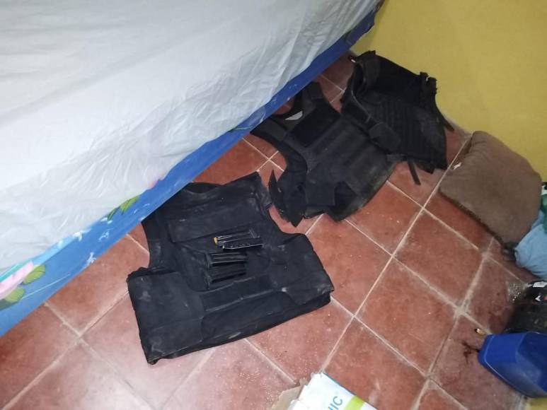 Droga, uniformes policiales y hasta buses robados hallan en taller clandestino en Comayagua