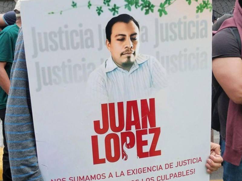 Manifestantes exigen justicia por el asesinato del ambientalista Juan López en Tocoa.