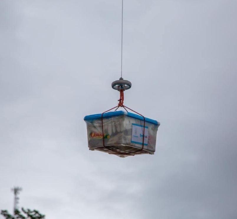 Así fue el traslado de víveres en dron hasta el caserío Sizama, Atlántida