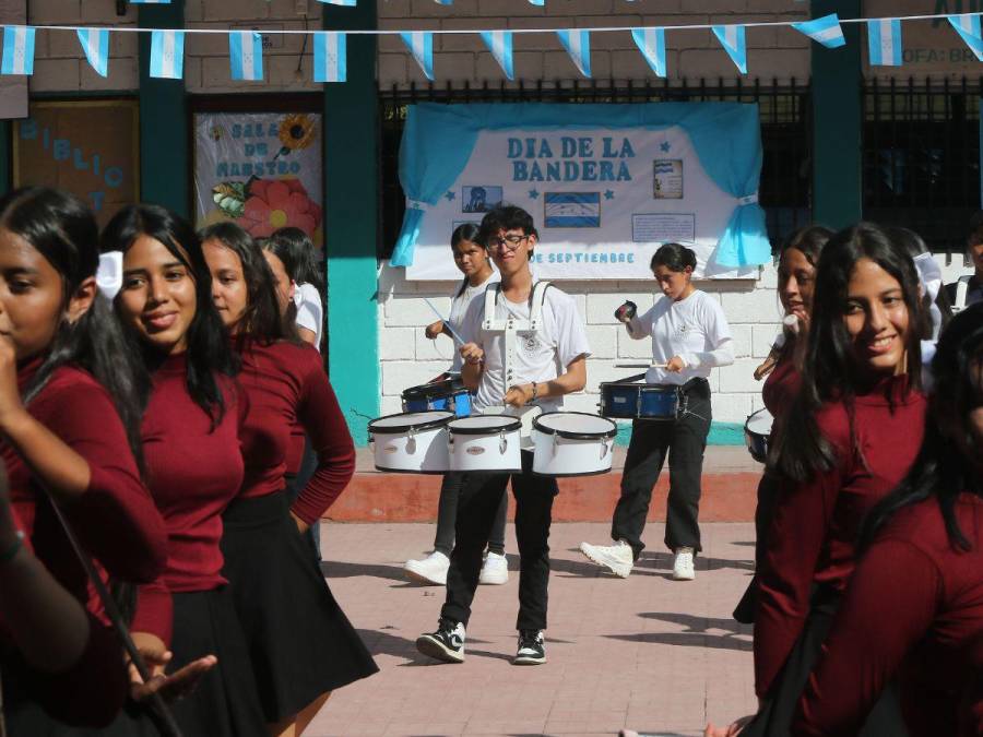 Con acrobacias y coreografía, banda del San Juan Bosco prepara espectáculo en desfiles